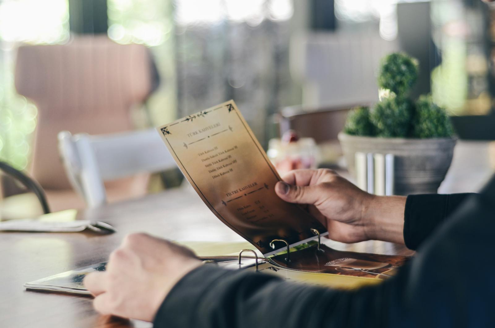 6 things people who grew up lower middle class instinctively calculate before entering any restaurant, and none of them involve whether they're actually hungry - Silicon Canals