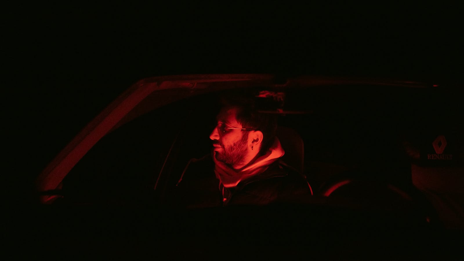 person alone car night