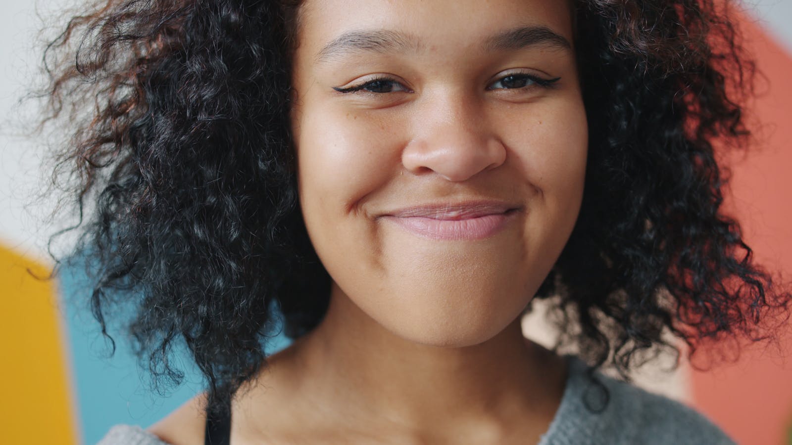 person smiling awkwardly