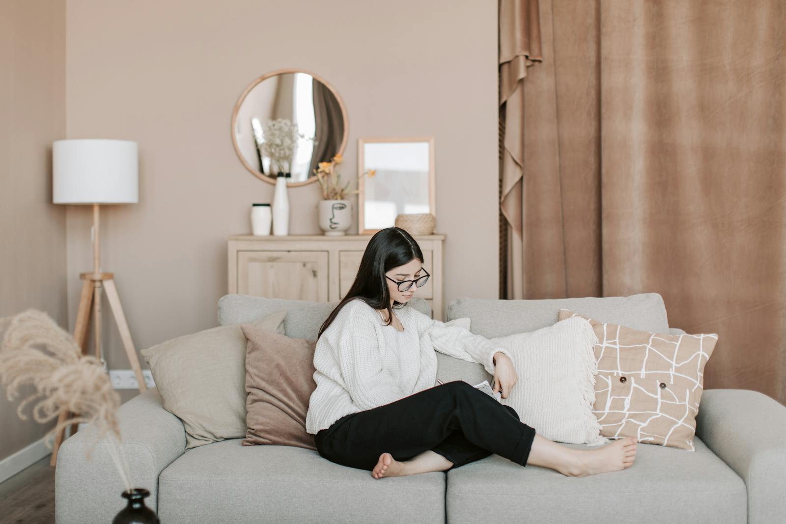 woman thinking on couch