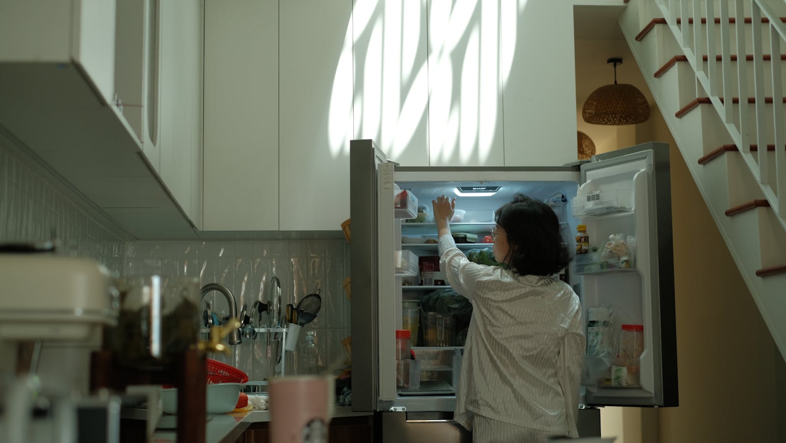 The person who keeps their refrigerator nearly empty isn't minimalist, they grew up understanding that a full fridge could be inspected, weaponized, or held against them later