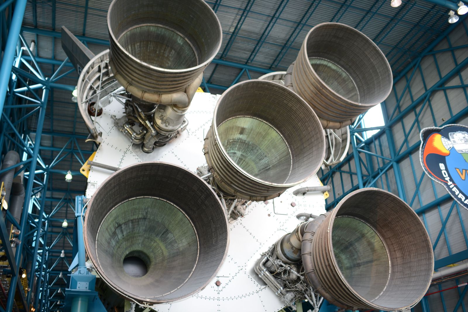 On July 20, 1969, as Apollo 11 descended toward the Sea of Tranquility, Margaret Hamilton's software survived five alarms in four minutes because her team had built a priority scheduler that shed lower-priority tasks instead of crashing