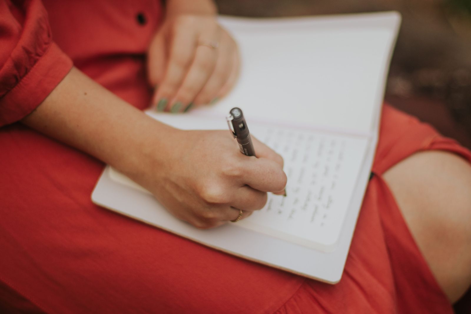 hands writing journal