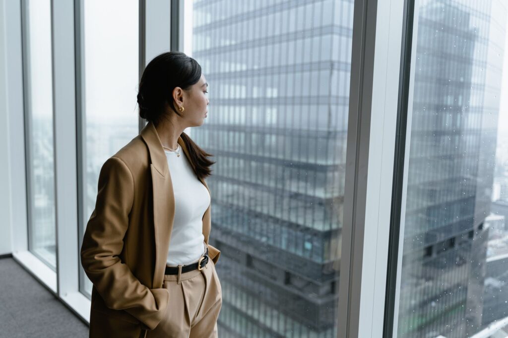 Representative image of a professional looking out over a city