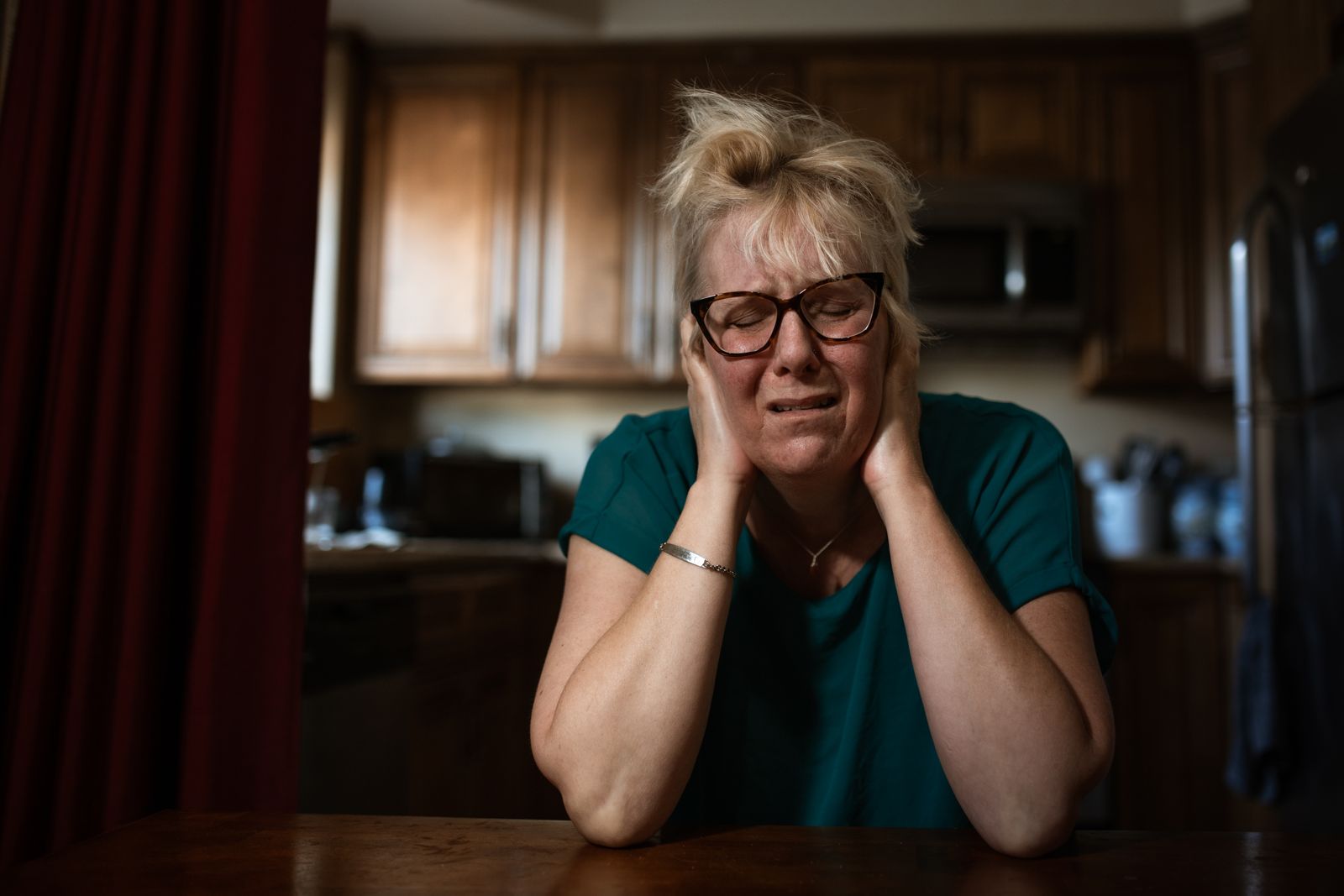 Adults who apologise for crying aren't over-emotional, they were taught early that tears were an inconvenience someone else had to manage, and the apology is the tax they still pay for feeling anything visible