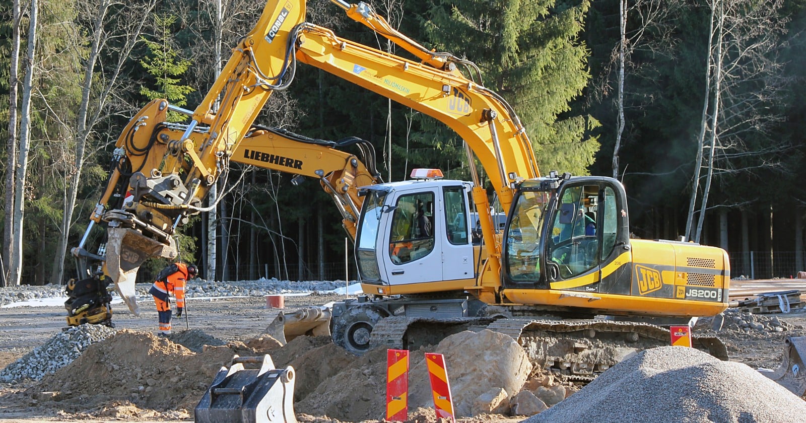 SoftBank is putting $200 million into the excavator-automation startup Gravis Robotics, whose headline productivity figure was stated two different ways on announcement day, with no published method behind either version