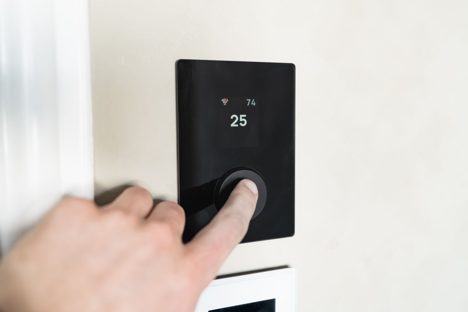 hand adjusting thermostat
