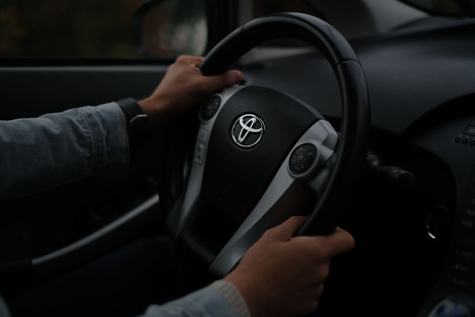 hands on steering wheel