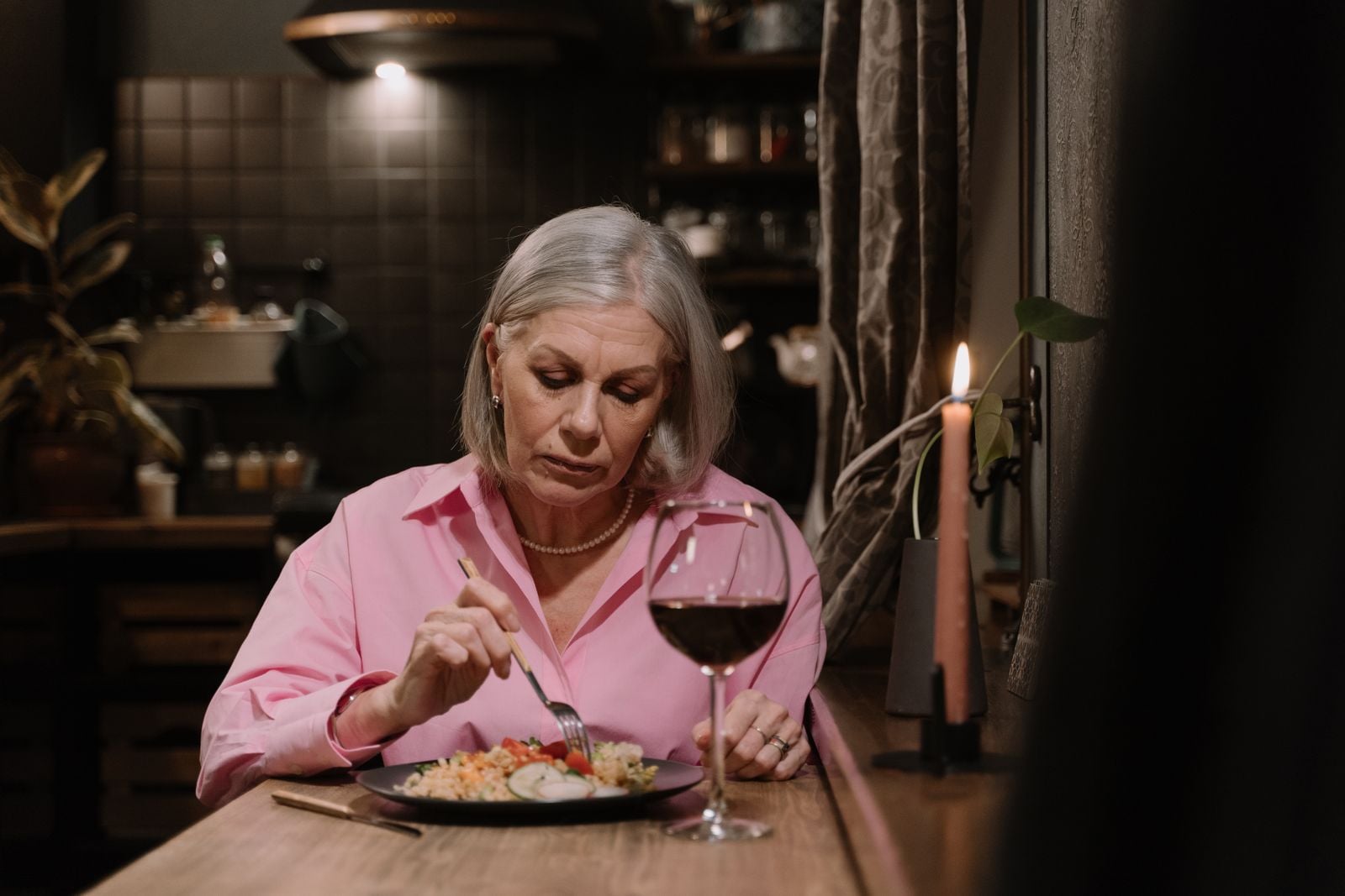 older woman quiet dinner