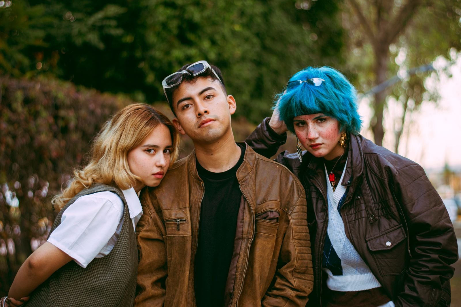 People who go quiet during group photos aren't always camera-shy: for some, being told to look happy for a picture asks them to perform a feeling faster than it can honestly arrive, and they'd rather not lie in an image that outlives the day