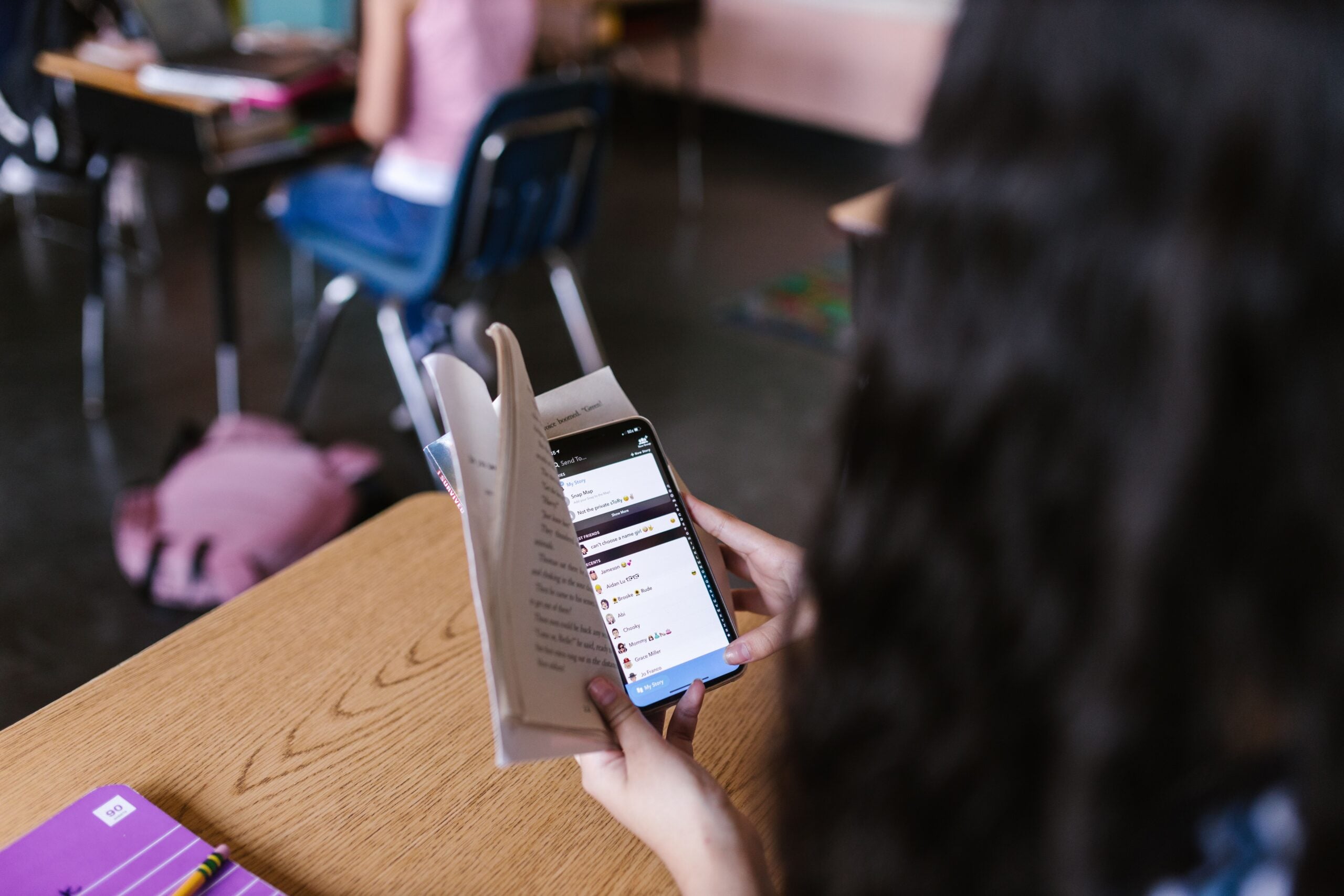 A randomized trial coauthored by a Wharton researcher followed nearly 17,000 students across 10 Indian colleges and found that collecting phones at the beginning of lectures modestly raised grades—with lower-performing students gaining roughly twice as much as the average student.