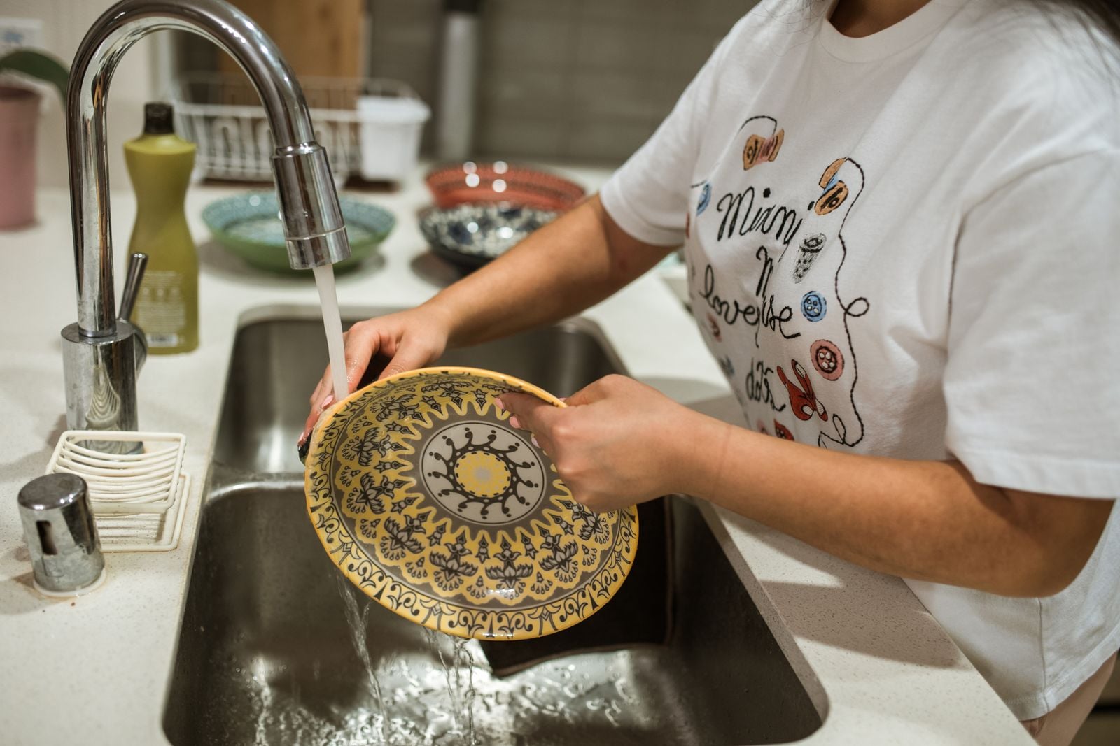 People who hum quietly while doing dishes or folding laundry may not be filling silence, the sound can slow the breath, steady attention, and make an ordinary task feel easier to move through