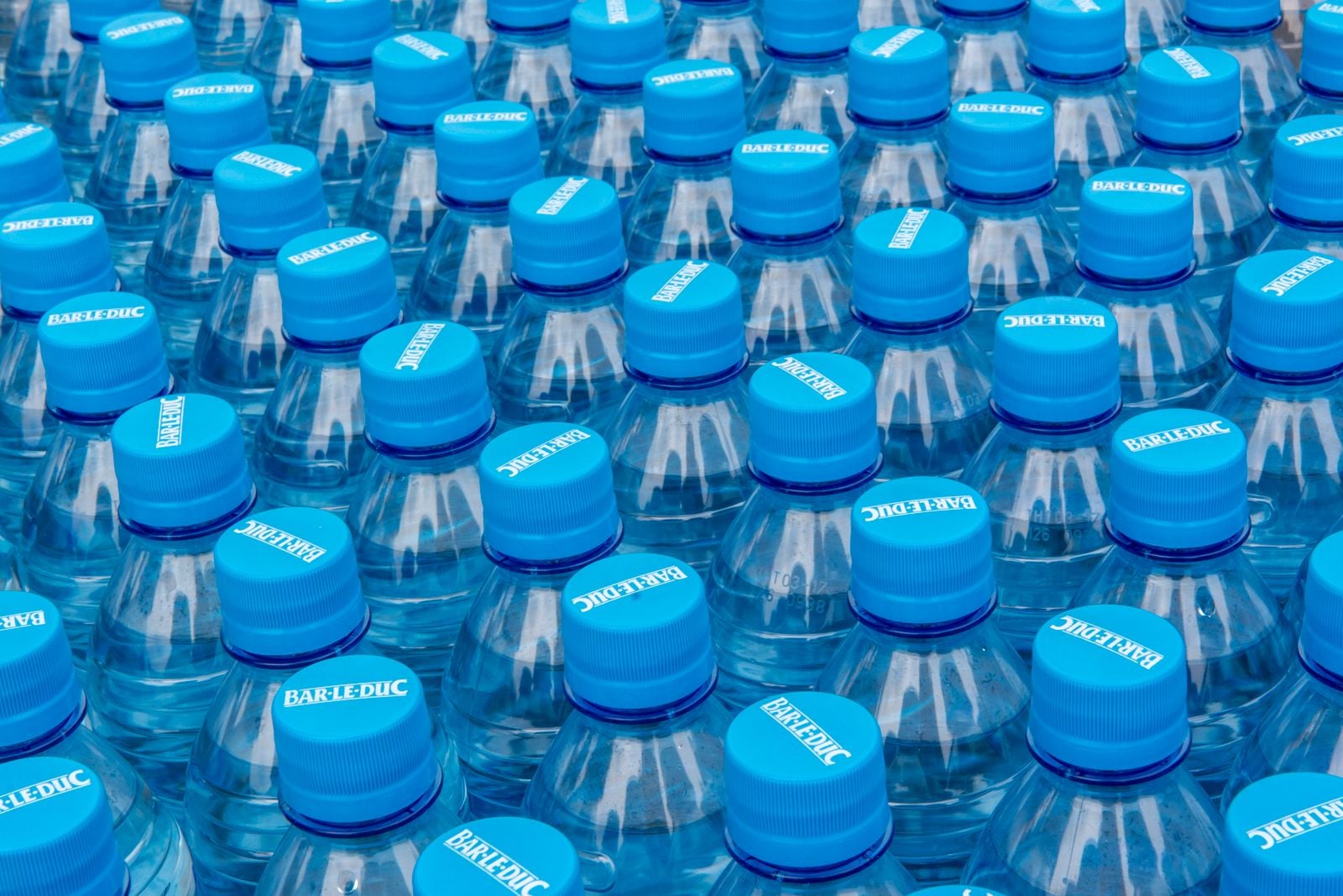 A Columbia team counted about 240,000 plastic particles in a litre of bottled water and put their mass at roughly 10 nanograms: four and a half years into treaty talks there is no agreed text, and the only microplastics banned EU-wide are microbeads and glitter